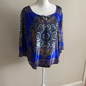 Vibrant blue patterned blouse